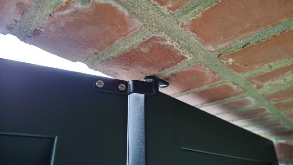 Volets battants ajourés en aluminium laqué vert sapin